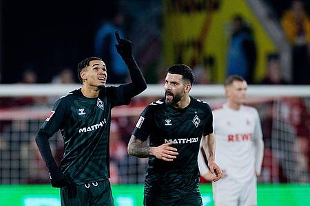 Schoss Werder als Joker zum Sieg in Köln: Justin Njinmah (l).