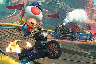 Nintendo/dpa-tmn | Süßer Pilz auf Dampfmotorrad: Toad im Rennen in «Mario Kart World».