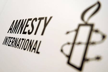 Das Logo von Amnesty International.